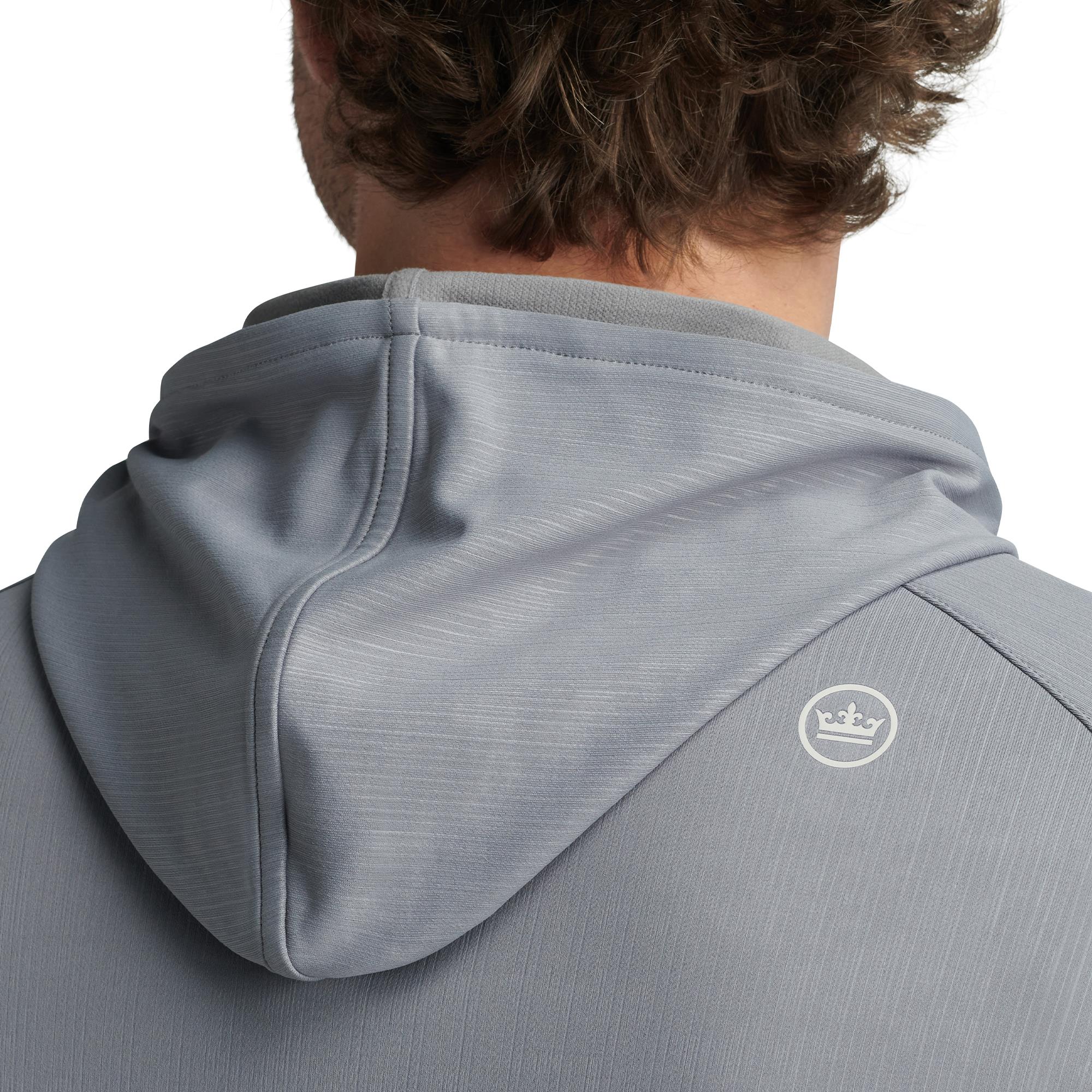 Close-up of back hood and Peter Millar logo on Pine Camo Performance Hoodie – mens golf hoodie from Peter Millar UK