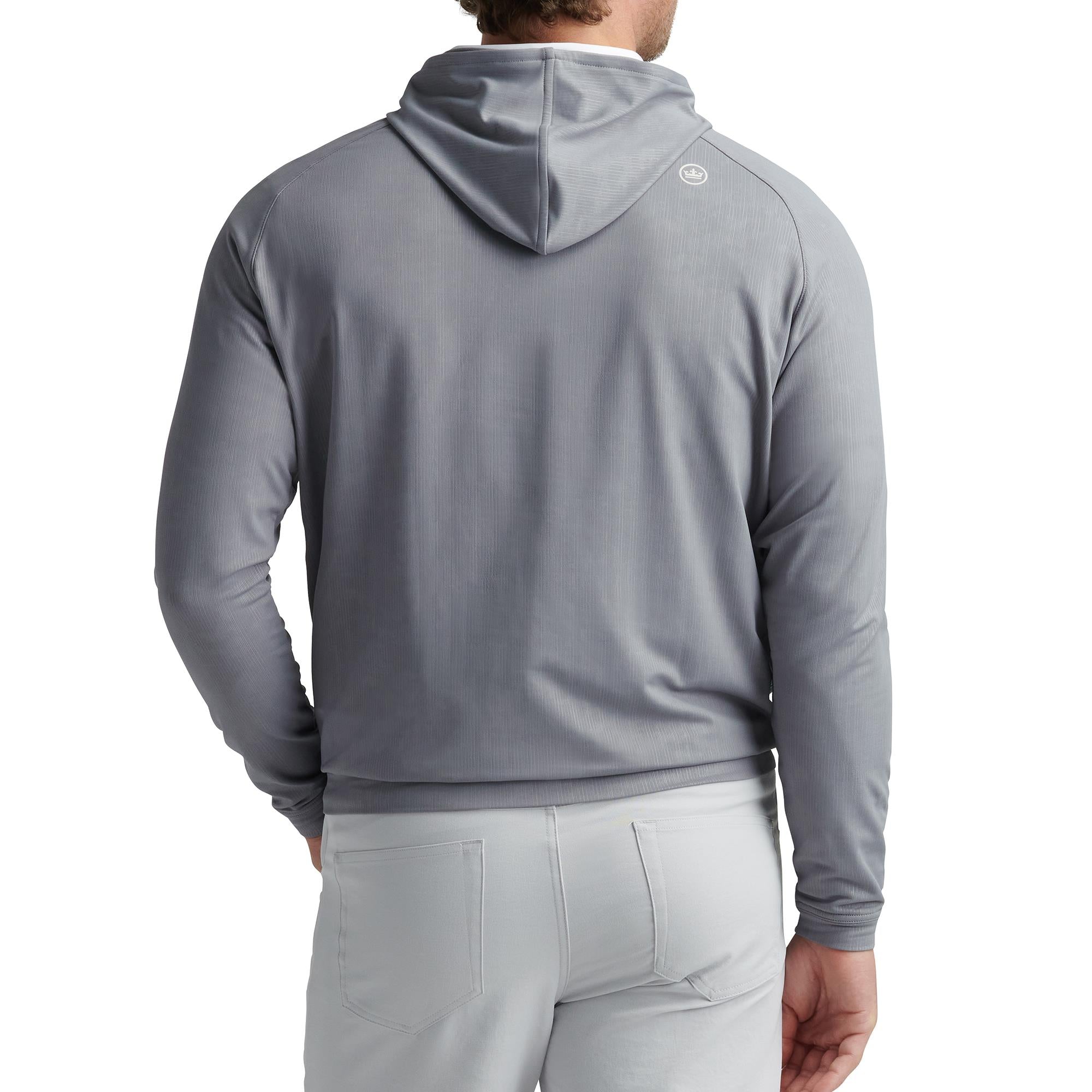 Close-up back view of model wearing Peter Millar Pine Camo Performance Hoodie – designer golf apparel UK