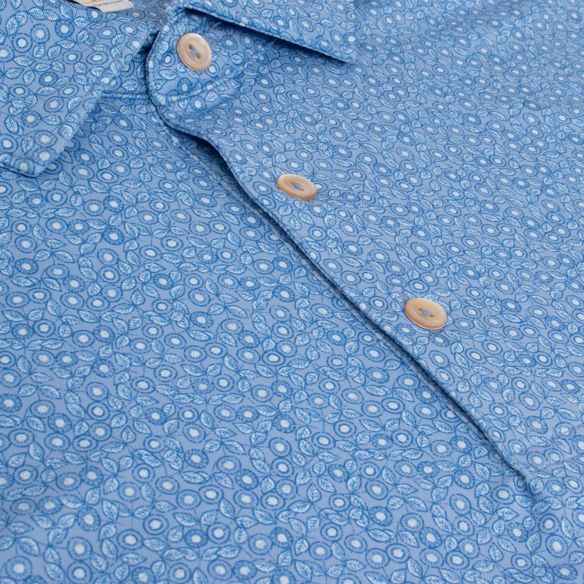 Close-up of floral pattern on Peter Millar Bristol Performance Jersey Polo Shirt – designer mens golf polo