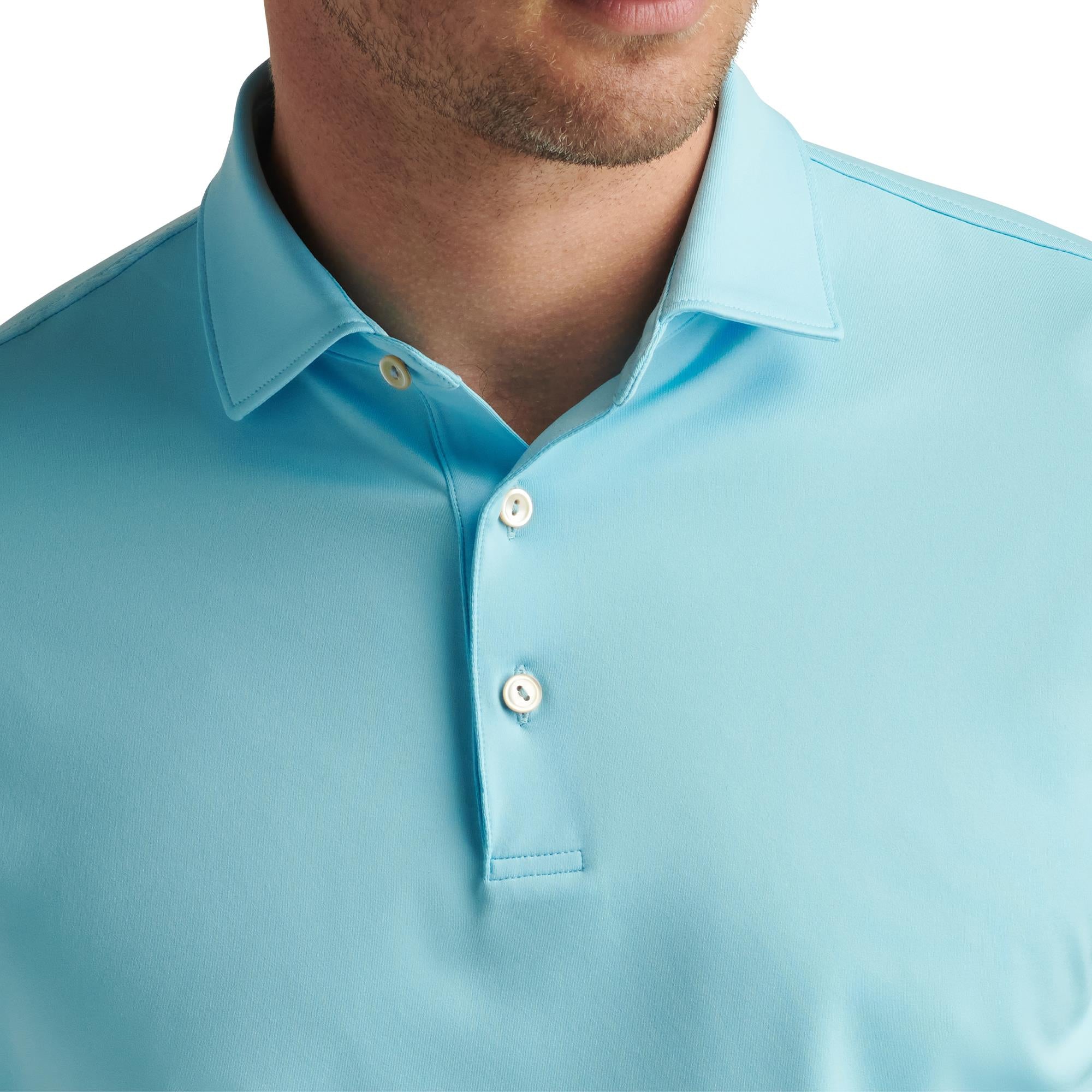Close-up of collar and buttons on Peter Millar Solid Performance Polo – clean design mens golf polo shirt