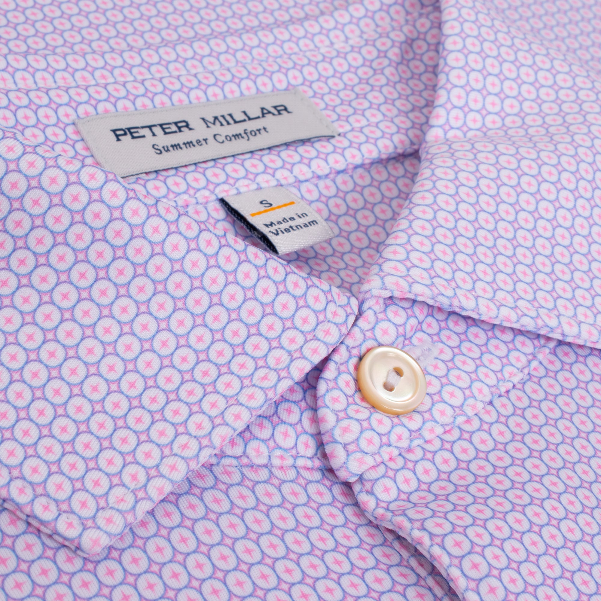 Collar close-up of Peter Millar Solid Polo in White Blue Sea – premium golf polo shirt for men