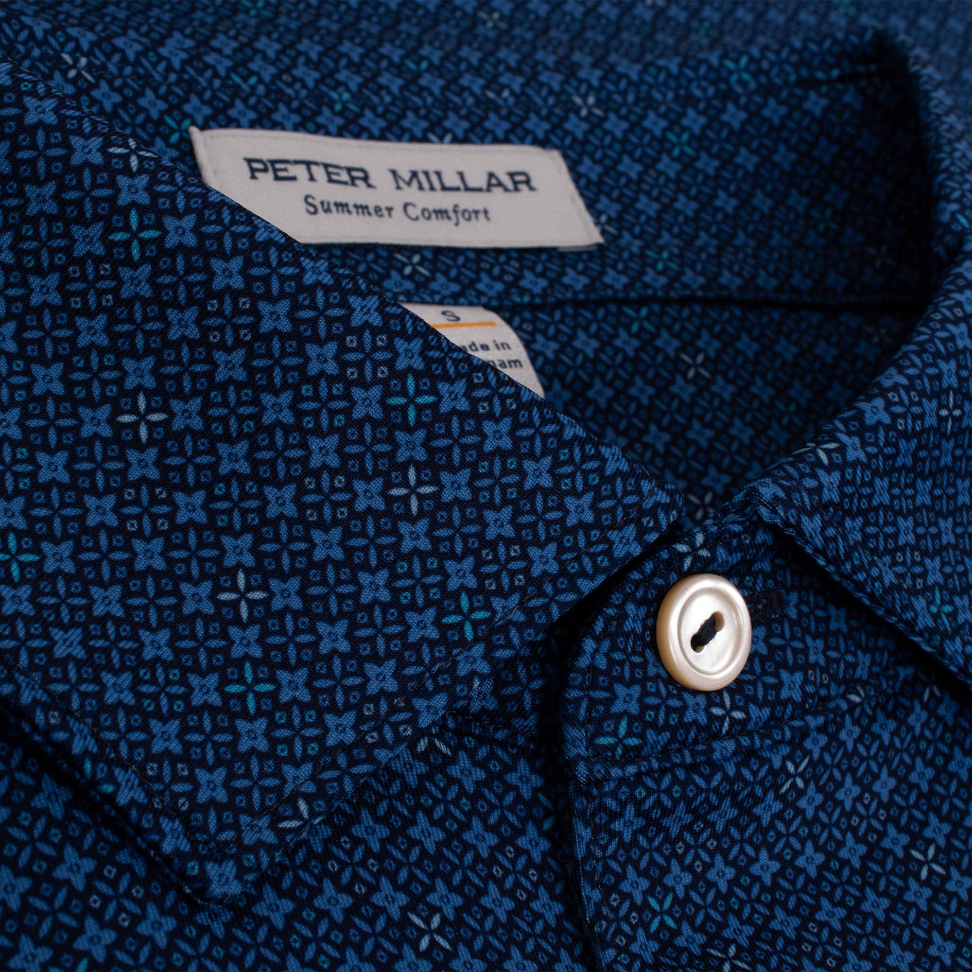 Detail of collar pattern on Peter Millar Castellina Polo Shirt – luxury mens golf polo shirts
