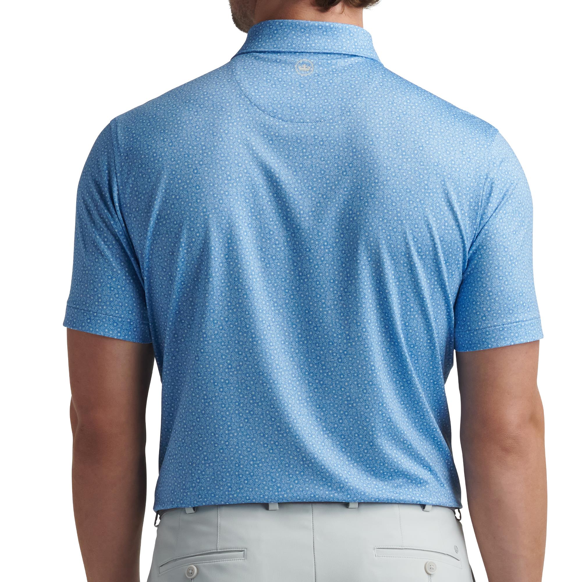 Back view of model wearing Peter Millar Bristol Floral Polo Shirt – mens golf polo shirt UK