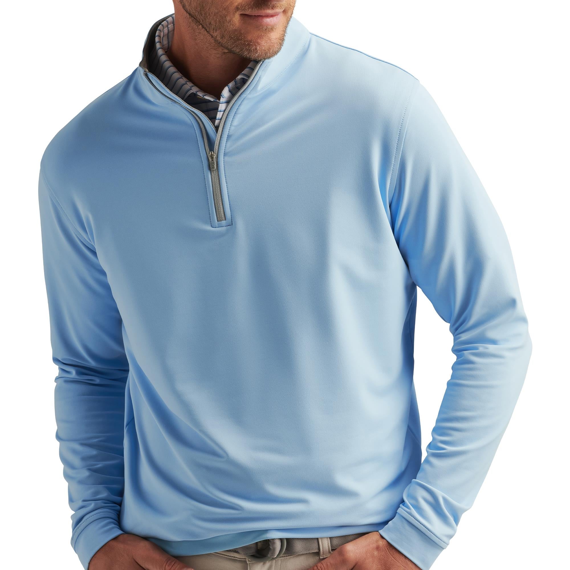 Model front view wearing Peter Millar Perth Stretch Mid Layer in Cottage Blue – mens golf layering piece