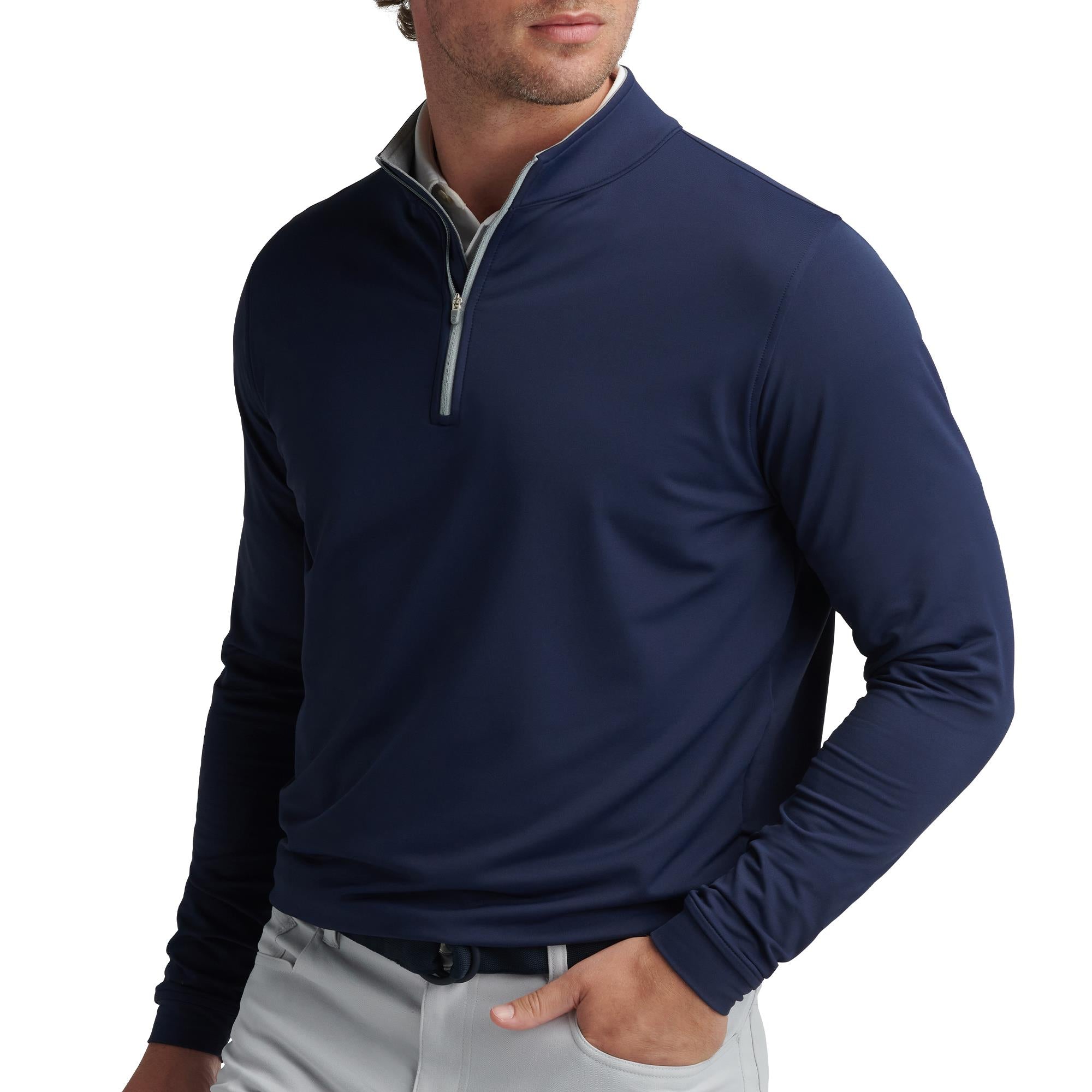 Model front view wearing Peter Millar Perth Stretch 1/4 Zip Mid Layer in Navy – premium mens golf mid layer