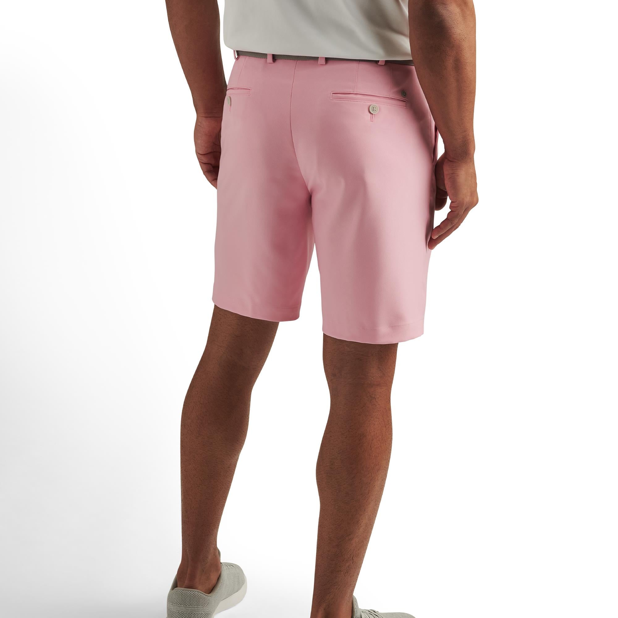 Back view of model in Peter Millar Salem High Drape Performance Shorts – designer golf shorts for men