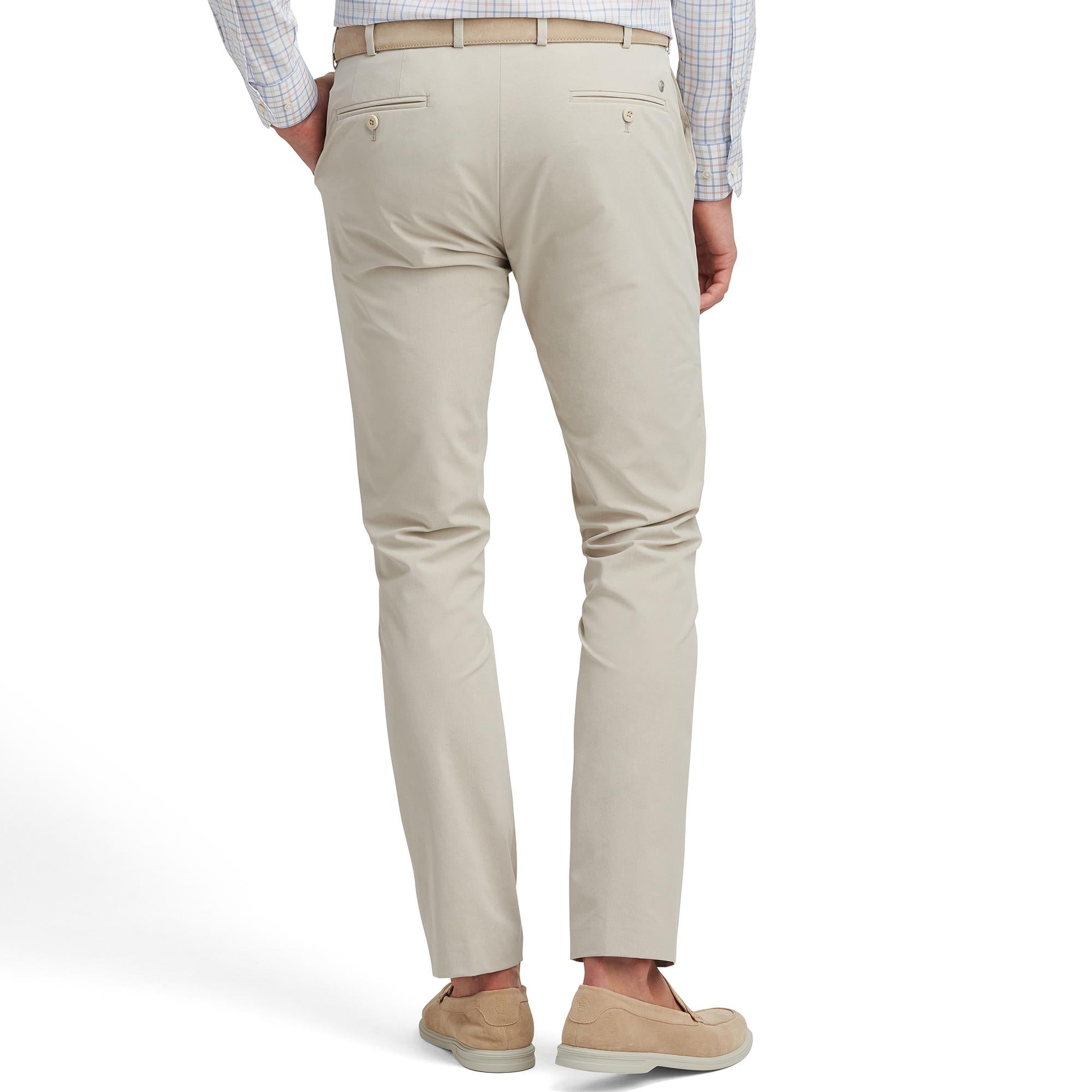 Model back view wearing Peter Millar Surge Performance Trousers – premium mens golf pants UK