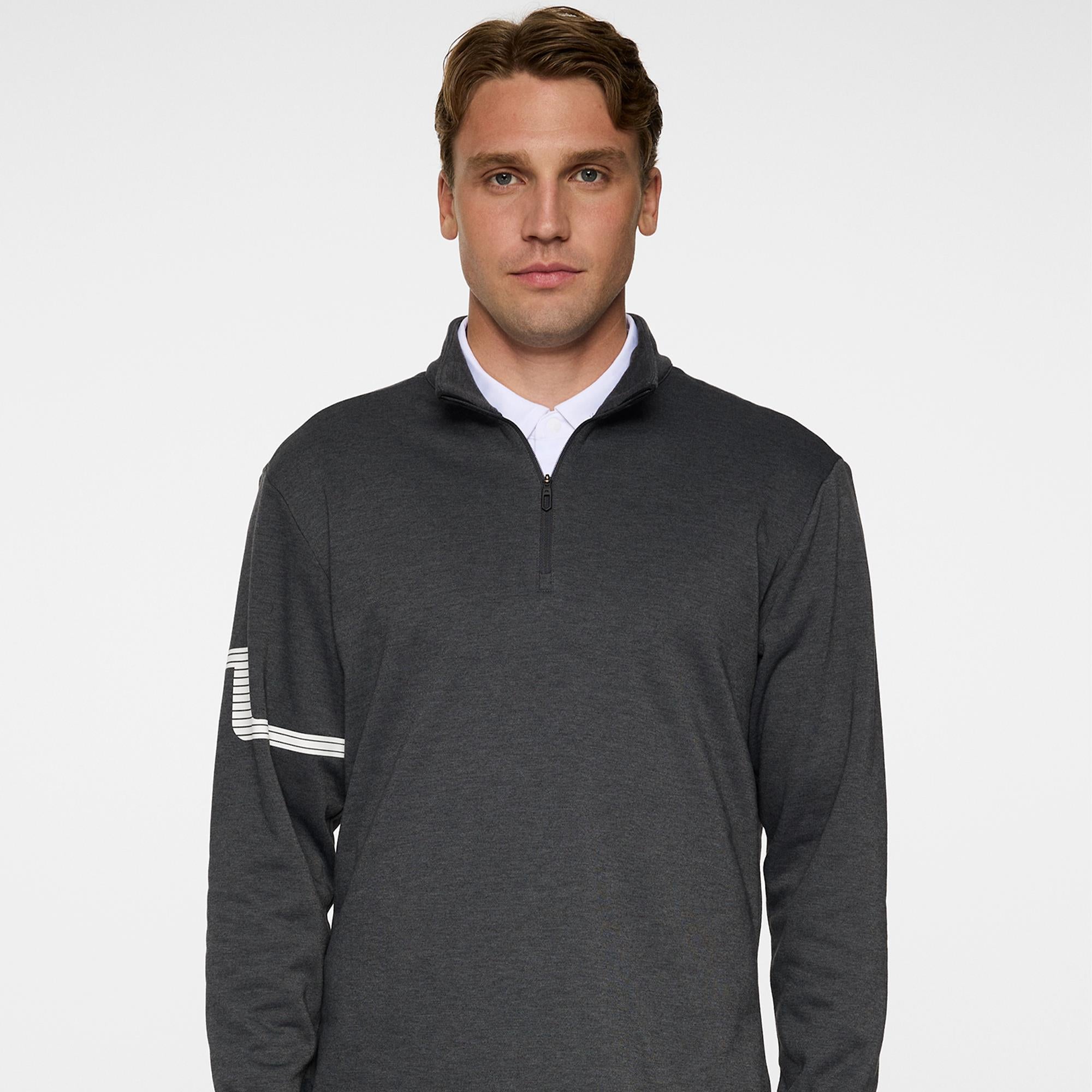 Model front view wearing J.Lindeberg Heath Strike Golf Mid Layer in Asphalt