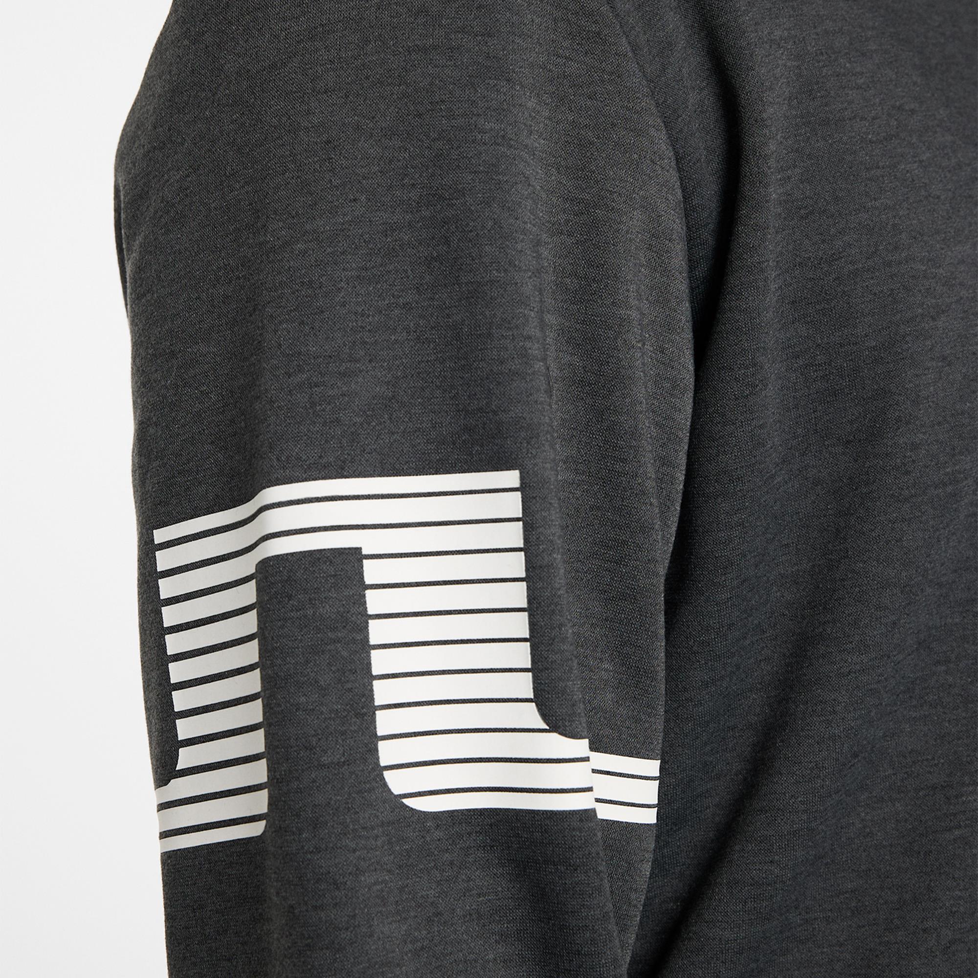 Close-up of JL Bridge logo on sleeve – J.Lindeberg Heath Strike Mid Layer Asphalt