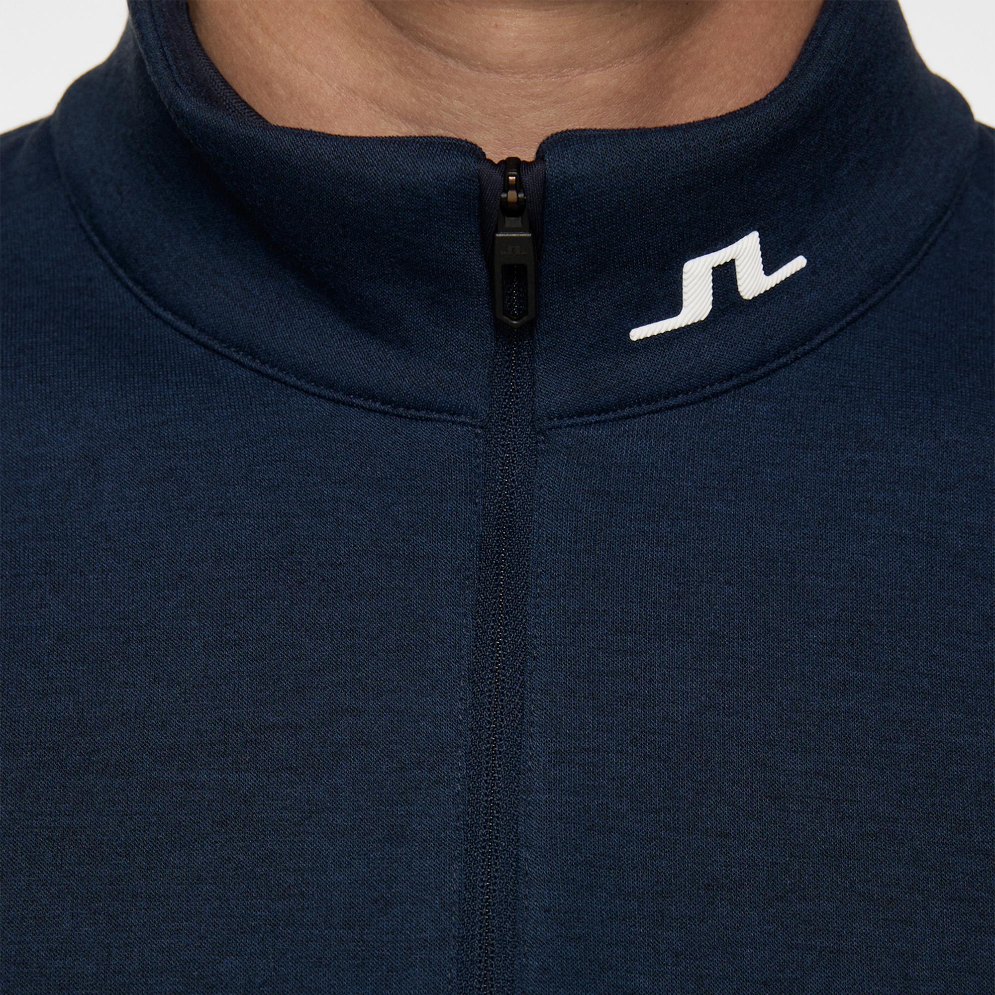 Zip and JL logo collar close-up – Heath Strike Men's Golf Mid Layer