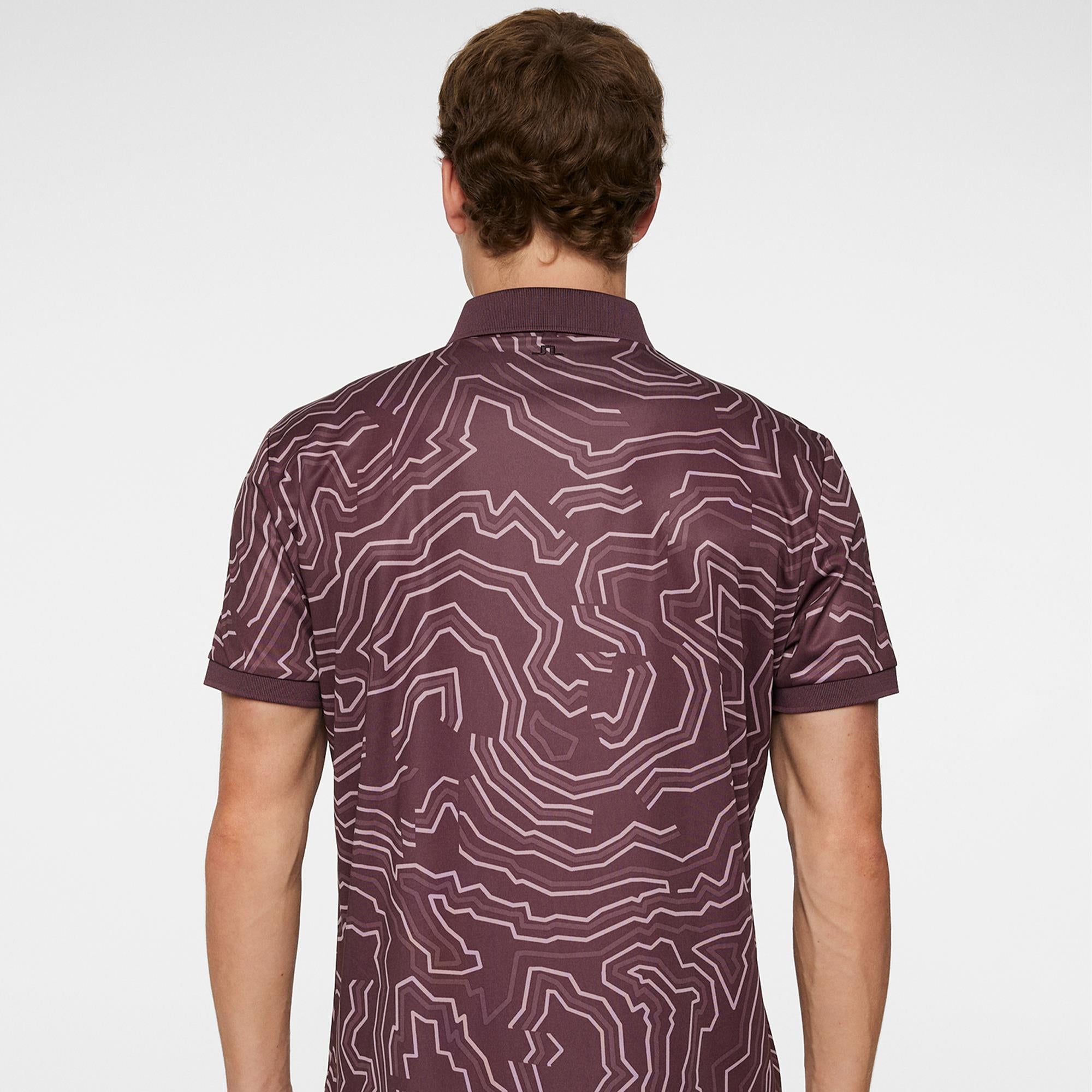 Back model shot showing J.Lindeberg men’s golf polo shirt Topo Huckleberry