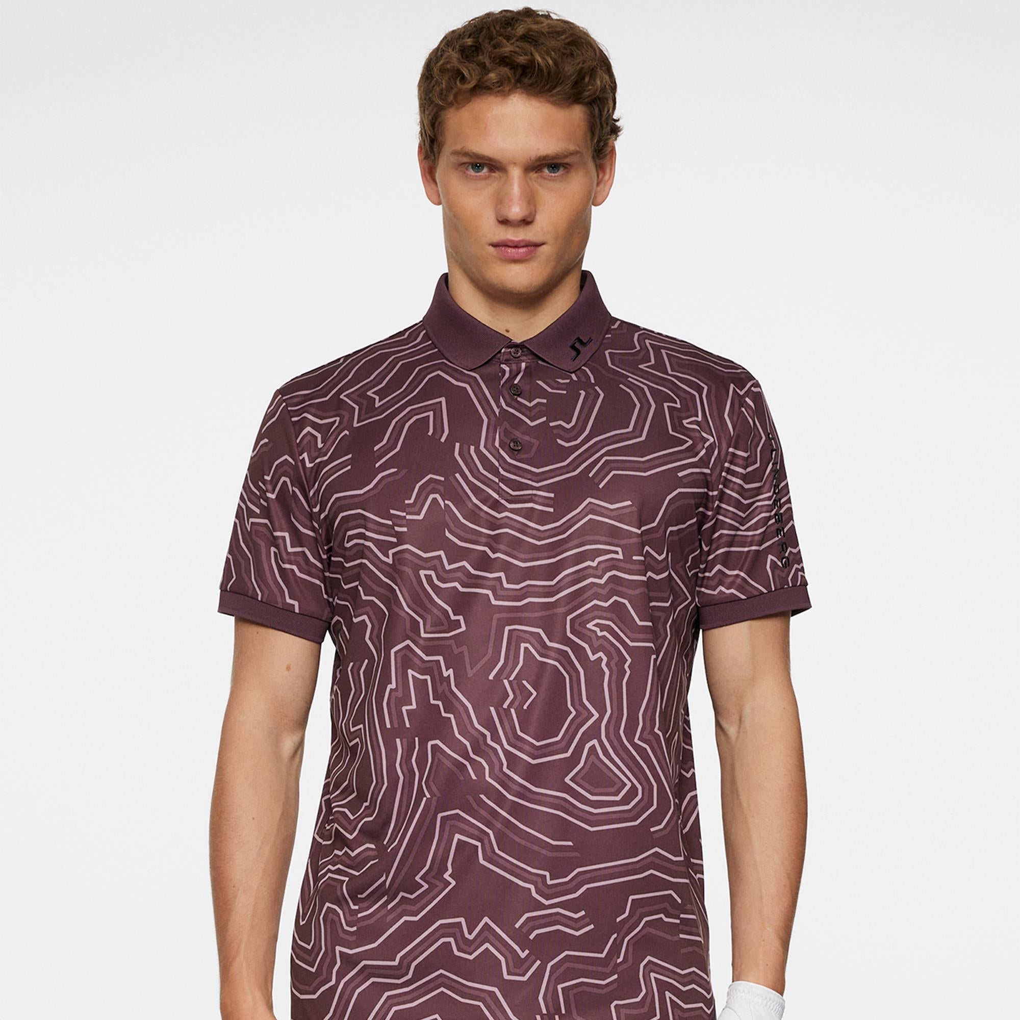 Front model shot wearing J.Lindeberg men’s golf polo shirt Topo Huckleberry