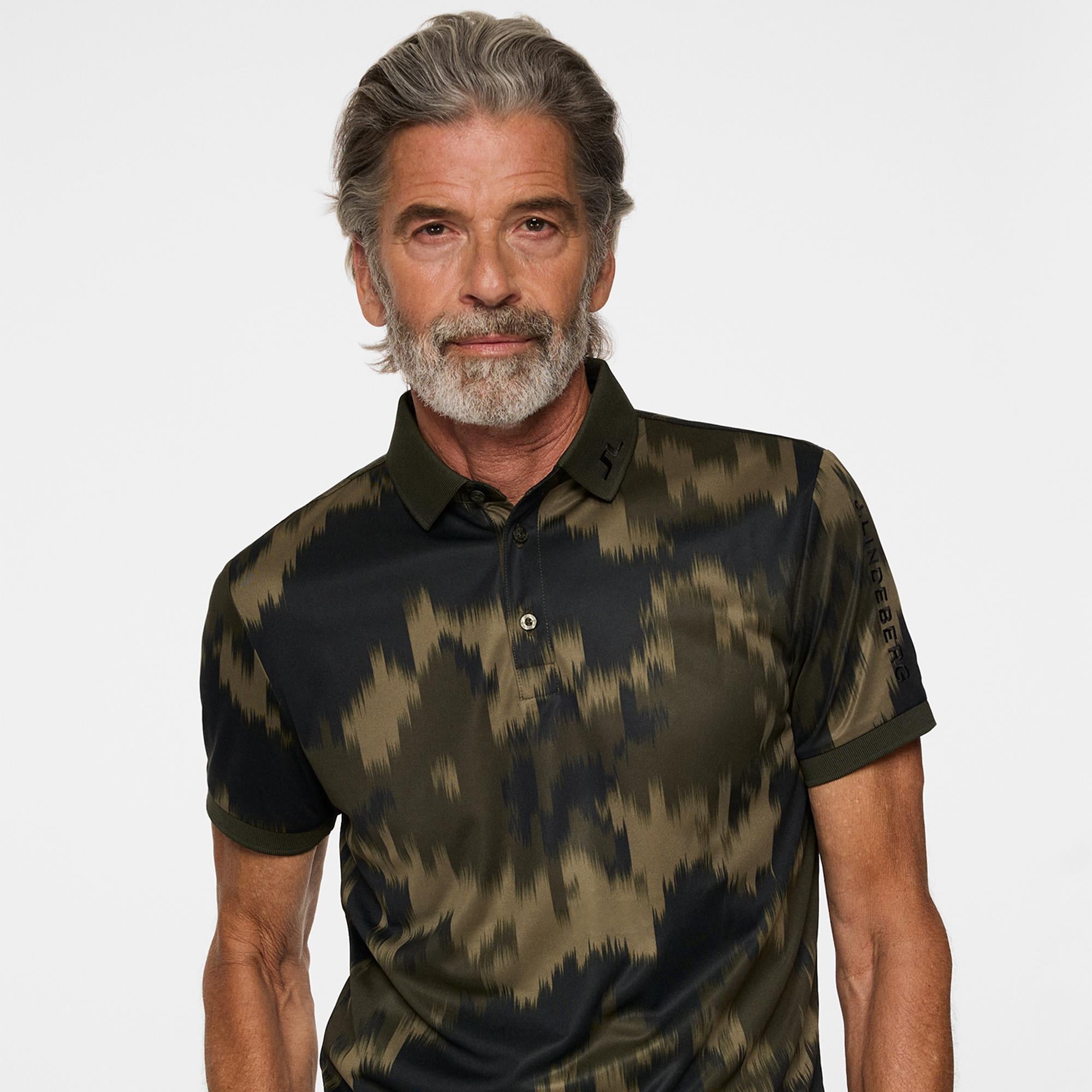 J.Lindeberg men’s golf polo shirt front posed model shot in Warp Forest at Teepeg
