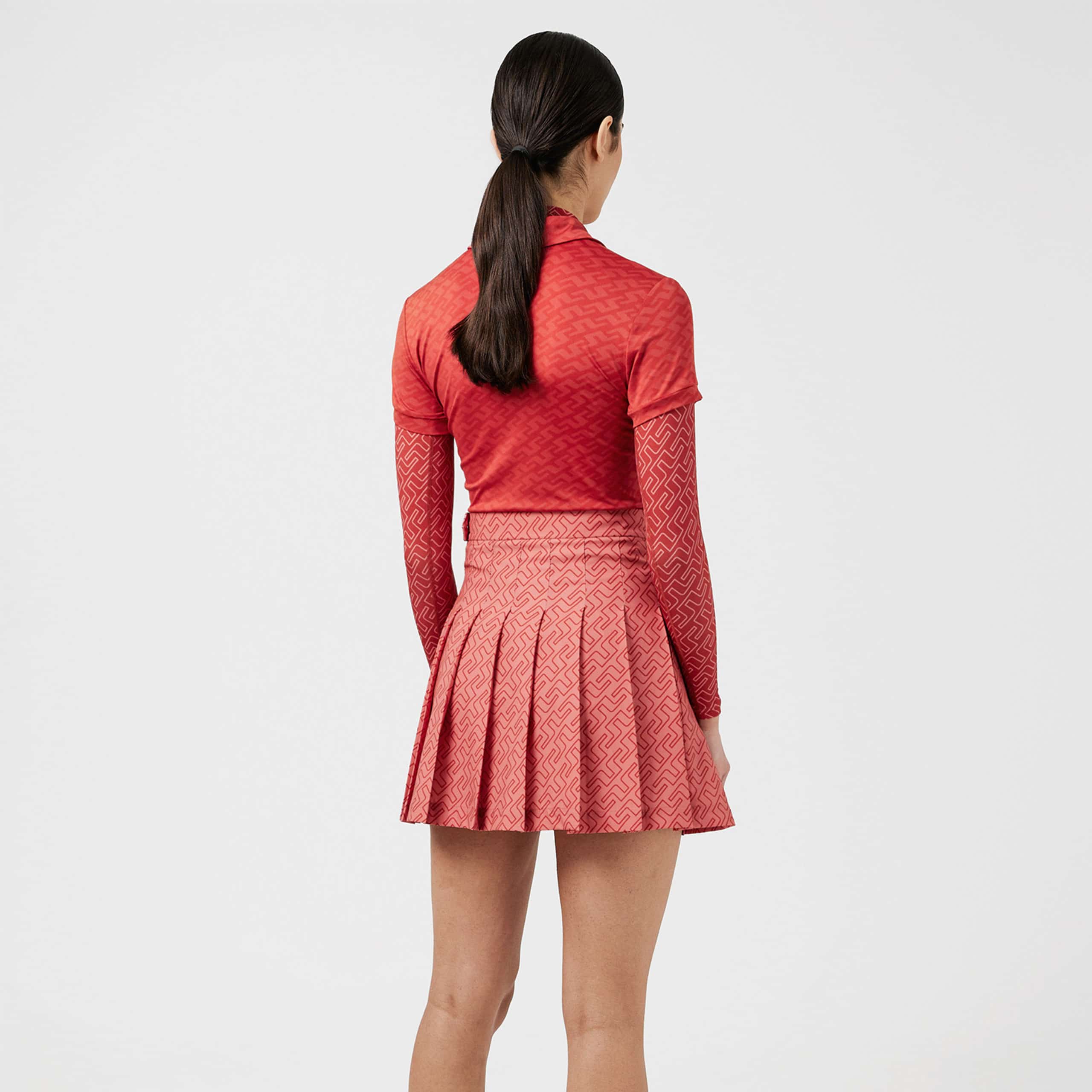 J Lindeberg Adina Print Ladies Golf Skirt Faded Rose Bridge Monogram